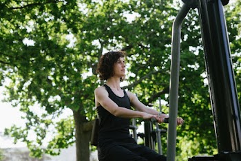 Photo Of Woman Using Sports Equipment