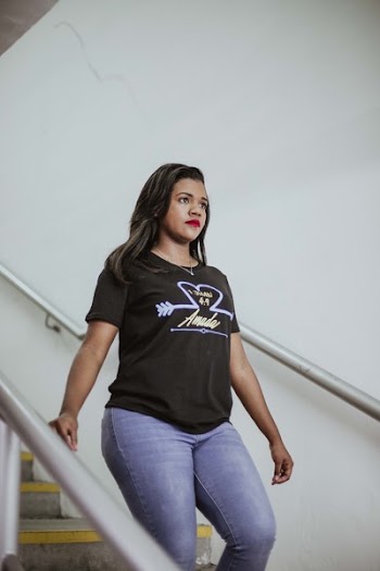 Photo of Woman Walking Down a Flight of Stairs