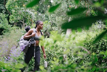 Photo Of Woman Walking In The Forest