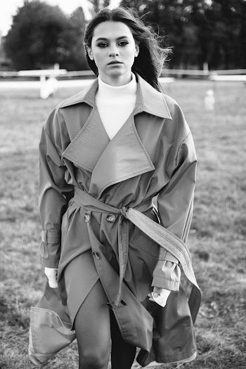 Photo Of Woman Walking On Grass Field