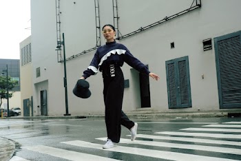 Photo Of Woman Walking On Pedestrian Lane