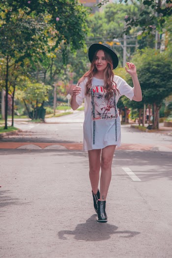 Photo Of Woman Walking On Road