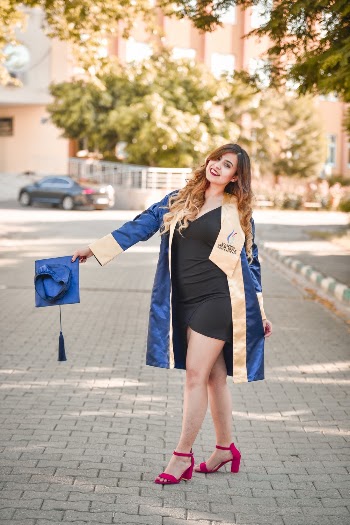 Photo of Woman Wearing Academic Dress