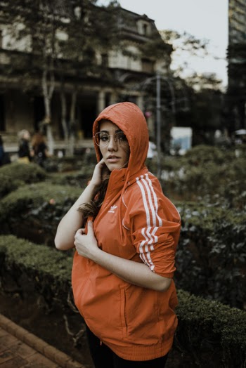 Photo of Woman Wearing Adidas Hoodie