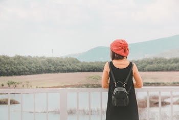 Photo of Woman Wearing Backpack