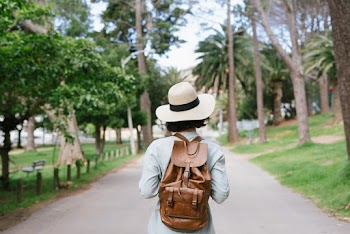 Photo Of Woman Wearing Backpack 