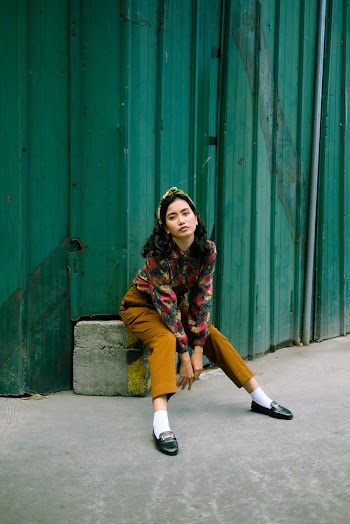 Photo of Woman Wearing Bandana