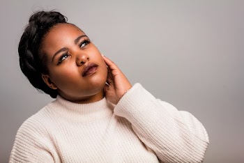 Photo Of Woman Wearing Beige Sweater