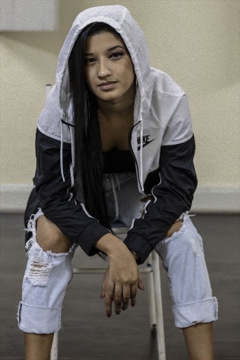 Photo of Woman Wearing Black And White Hoodie