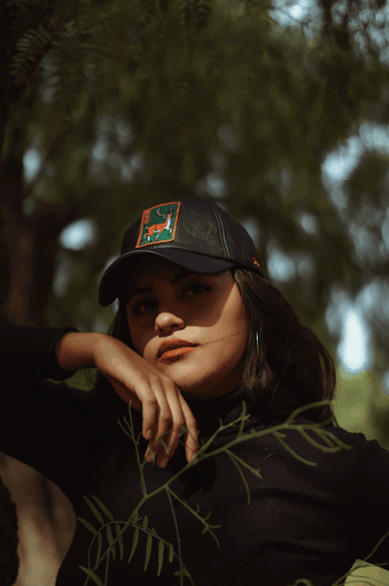 Photo of Woman Wearing Black Cap
