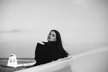 Photo Of Woman Wearing Black Coat