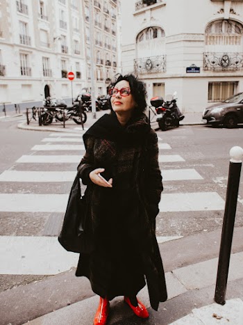 Photo Of Woman Wearing Black Coat