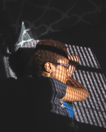 Photo of Woman Wearing Black Crew-neck Shirt