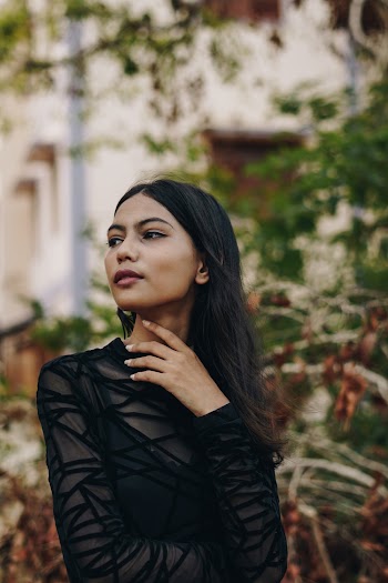 Photo of Woman Wearing Black Dress
