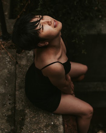 Photo of Woman Wearing Black Dress