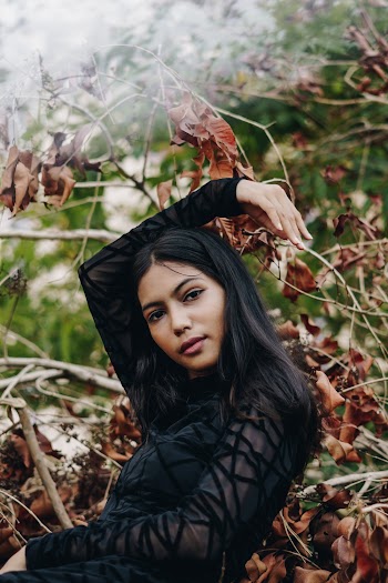 Photo of Woman Wearing Black Dress