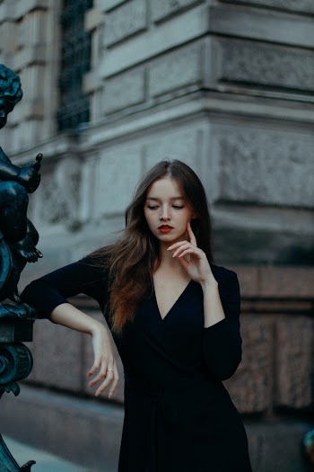 Photo Of Woman Wearing Black Dress