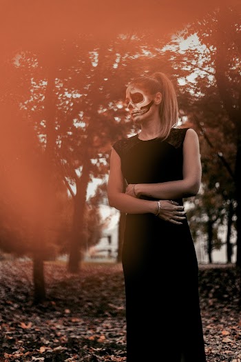 Photo Of Woman Wearing Black Dress