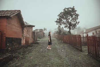 Photo Of Woman Wearing Black Dress
