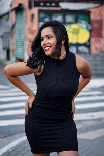 Photo of Woman Wearing Black Dress