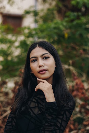 Photo Of Woman Wearing Black Dress