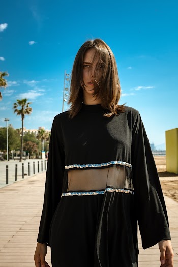 Photo Of Woman Wearing Black Dress During Daytime