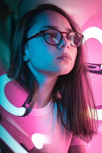 Photo Of Woman Wearing Black Eyeglasses