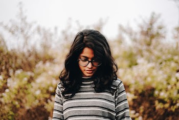 Photo Of Woman Wearing Black Eyeglasses