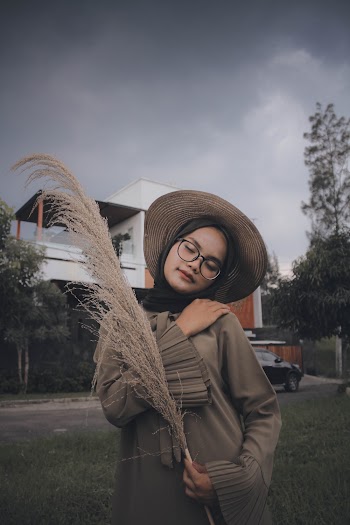 Photo Of Woman Wearing Black Eyeglasses
