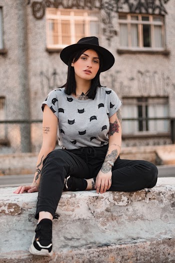 Photo of Woman Wearing Black Fedora