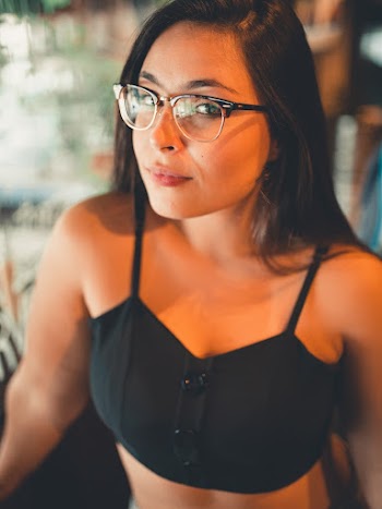 Photo Of Woman Wearing Black Framed Eyeglasses