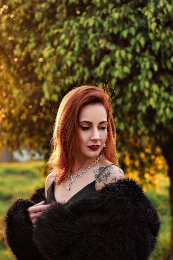 Photo Of Woman Wearing Black Fur Coat