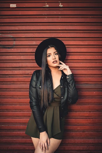 Photo of Woman Wearing Black Hat