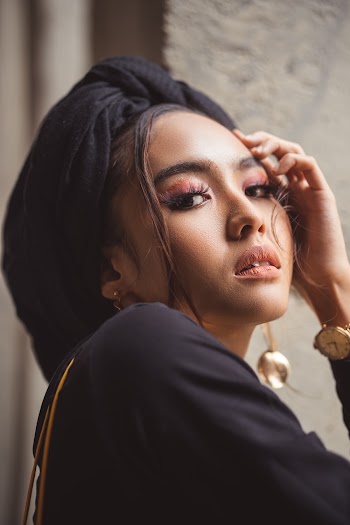 Photo Of Woman Wearing Black Headdress