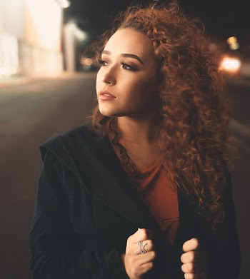 Photo of Woman Wearing Black Jacket