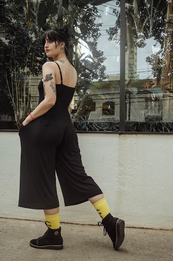 Photo of Woman Wearing Black Jumpsuit