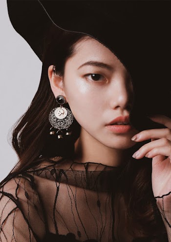 Photo Of Woman Wearing Black Lace Top