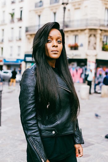 Photo of Woman Wearing Black Leather Jacket