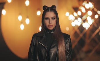 Photo Of Woman Wearing Black Leather Jacket