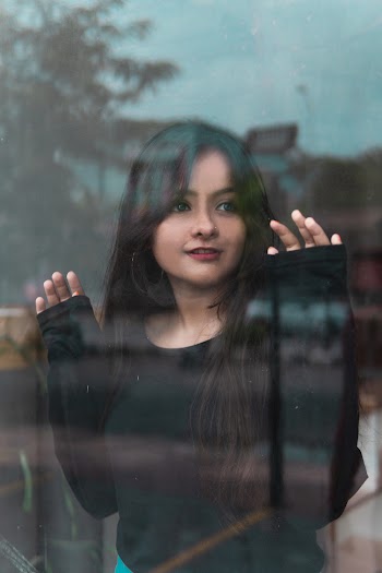 Photo of Woman Wearing Black Long-sleeved Shirt