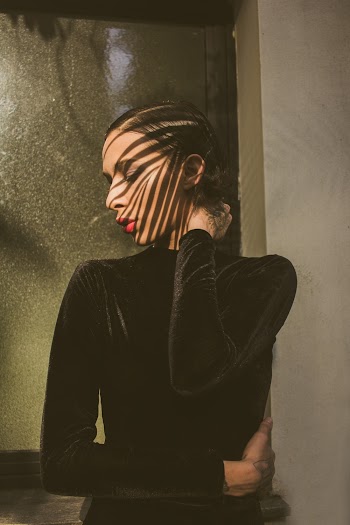Photo of Woman Wearing Black Long Sleeves