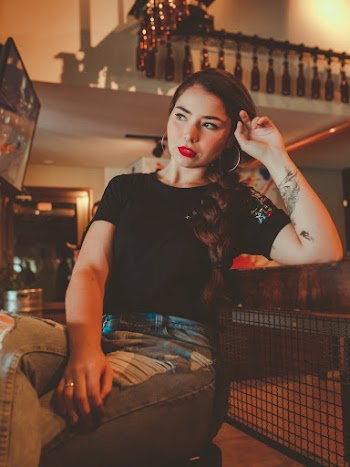 Photo Of Woman Wearing Black Shirt