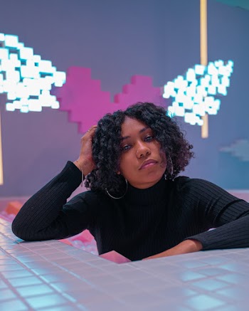 Photo Of Woman Wearing Black Sweater