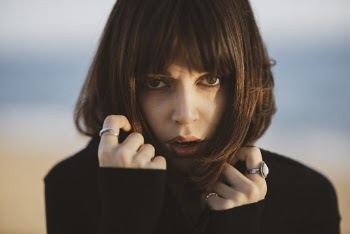 Photo Of Woman Wearing Black Sweater