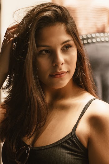 Photo of Woman Wearing Black Tank Top