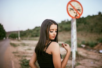 Photo Of Woman Wearing Black Tank Top