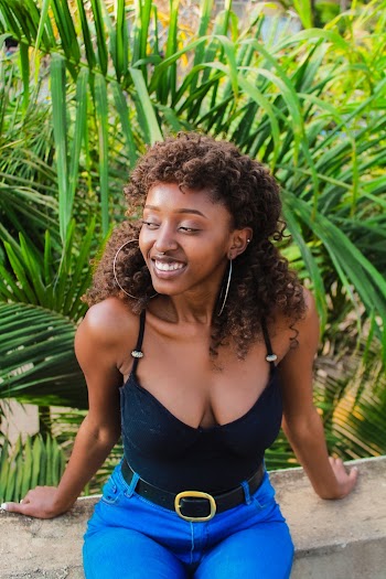 Photo Of Woman Wearing Black Tank Top