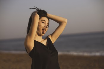Photo Of Woman Wearing Black Tank Top