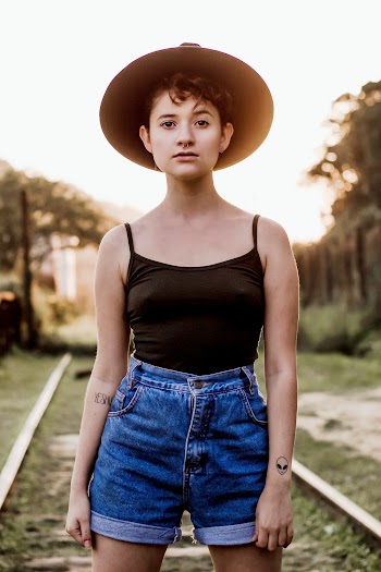 Photo Of Woman Wearing Black Tank Top