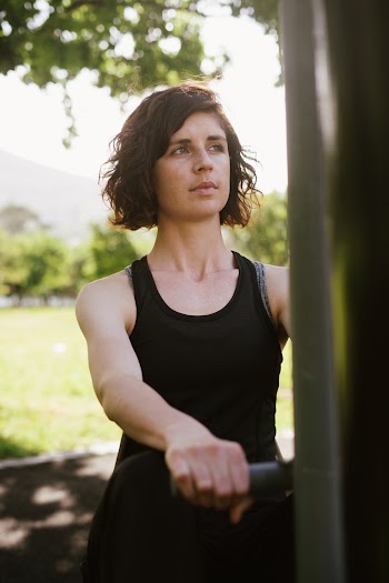 Photo Of Woman Wearing Black Tank Top
